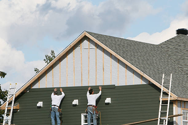 Professional Siding Replacement technician working in Windber, PA